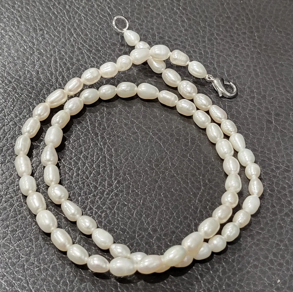 Freshwater Knotted String Of White Rice Pearls